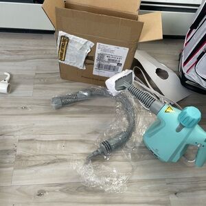 Teal Handheld Steam Cleaner